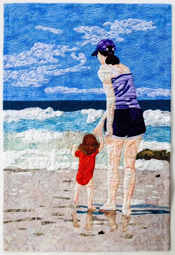 Artwork by Laurie Mutalipassi (a woman and child on the beach)