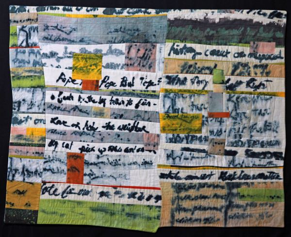 Colleen Ansbaugh - Lost Thoughts (art quilt made of long rectangular strips. Some have thick black writing on them that is not quite readable)