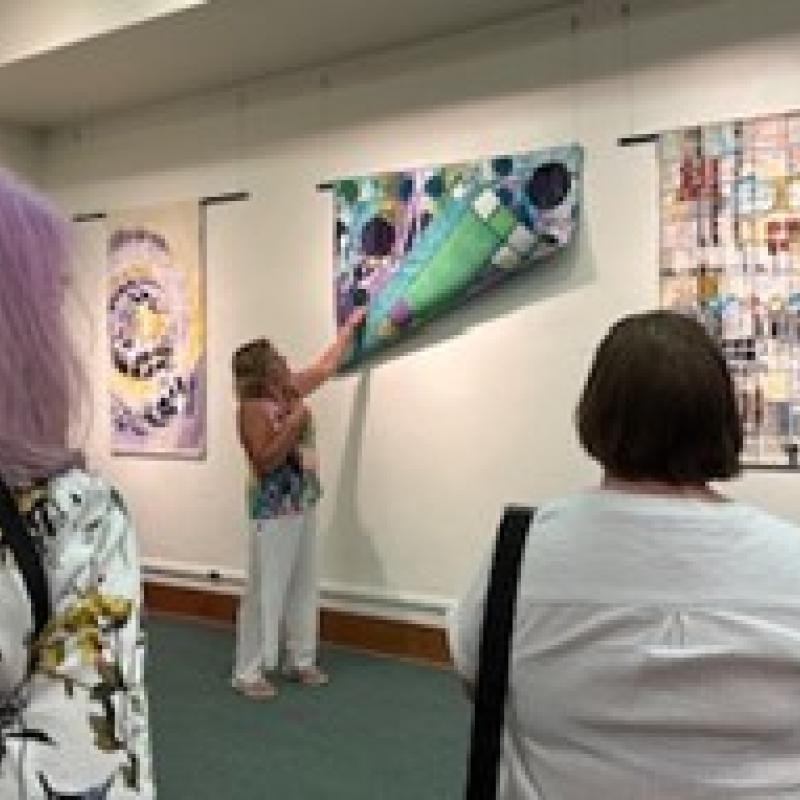 As part of the Quilters Hall of Fame Celebrations, honoree Katie Pasquini Masopust led gallery tours of her work.